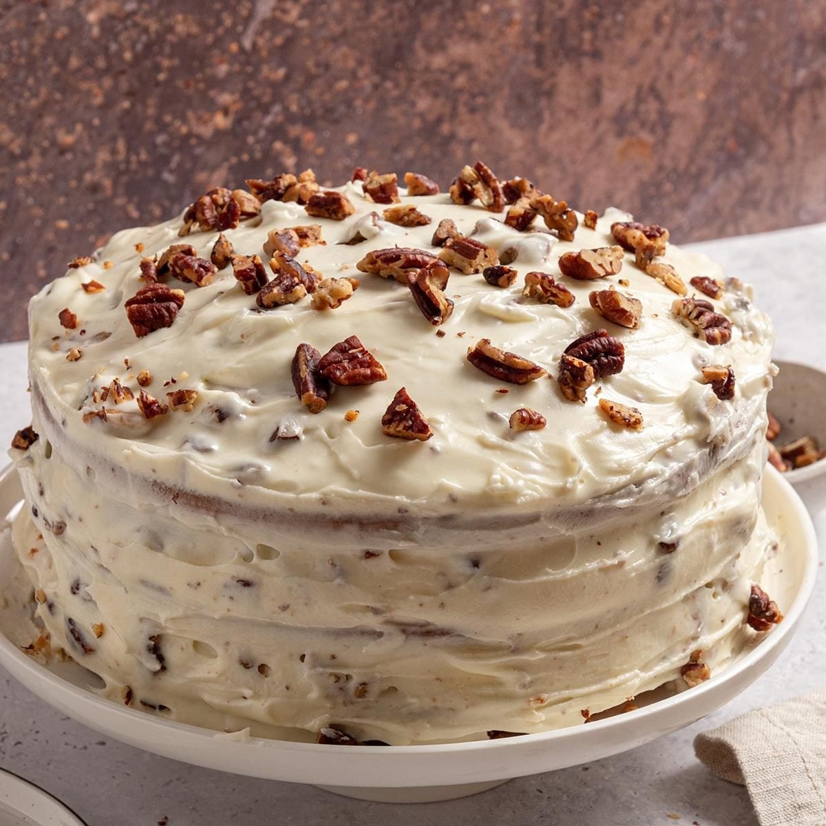 The Ultimate Butter Pecan Cake: Moist Layers & Brown Sugar Frosting